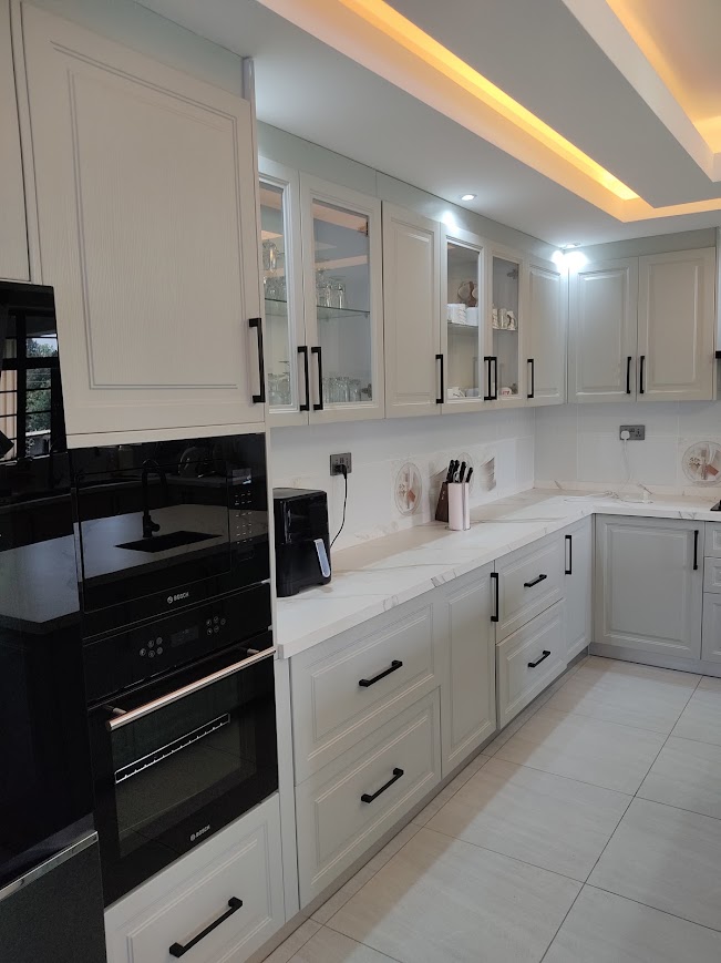 Mushroom Estate luxury kitchen with Bosch appliances and illuminated vitrines